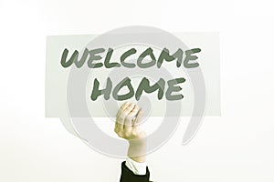 Handwriting text Welcome Home. Business idea Expression Greetings New Owners Domicile Doormat Entry photo