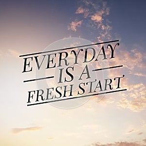 Inspirational motivating quote on nature background. Everyday is a fresh start.