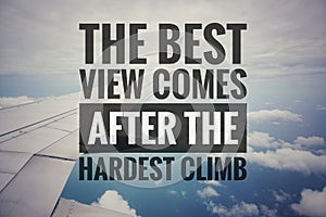 Inspirational motivating quotes on nature background. The best view comes after the hardest climb