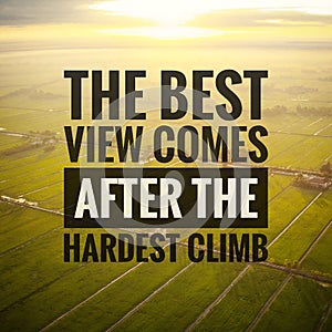 Inspirational motivating quotes on nature background. The best view comes after the hardest climb.