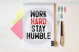 Inspirational and motivation life quote on notepad - Work Hard Stay Humble