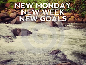 Inspirational and Motivational Concept - NEW MONDAY NEW WEEK NEW GOALS text background. Stock photo.