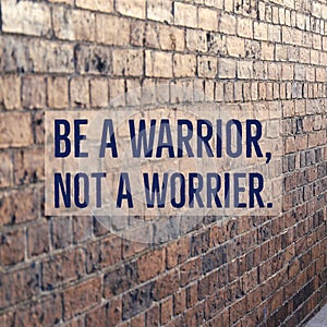Inspirational motivational quote `Be a warrior, not a worrier.` photo