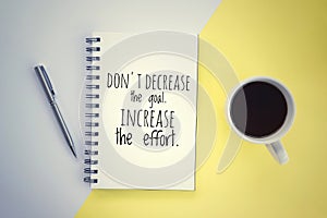 Inspirational motivational quote - Don`t decrease the goal. Increase the effort. Success business concept with coffee drink.