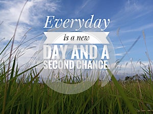 Inspirational motivational quote - Everyday is a new day and a second chance. With background of white clouds and bright blue sky