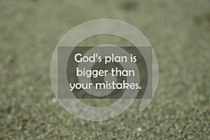 Inspirational motivational quote - Gods plan is bigger than your mistake. With blurry black sands pattern texture background.