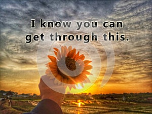 Inspirational motivational quote - i know you can get through this. With blurry image background of young woman holding sunflower