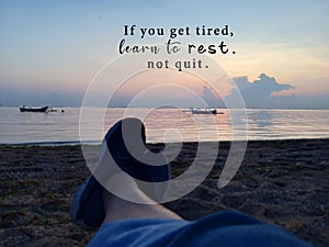 Inspirational motivational quote - If you get tired, learn to rest, not quit. With blurry image of young woman legs sitting alone