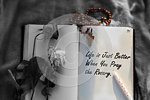 Inspirational motivational quote - Life is just better when you pray the Rosary. With Wooden Rosary beads and holy cross.