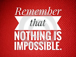 Inspirational motivational quote - Remember that nothing is impossible. Positive words design on red background.