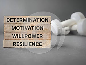 Inspirational and motivational words of determination motivation willpower resilience. Stock photo.