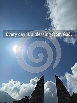 Inspirational quote - Every day is a blessing from God. Welcome to the world concept with gratitude with sun shine on over gate.