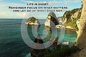 Inspirational quote  - Life is short. Remember focus on what matters and let go of what does not. With background of beach cliff.