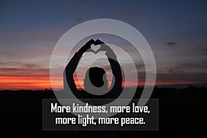 Inspirational quote - More kindness, more love, more light and peace. With silhouette of person holding a heart shaped hands