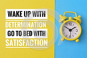 Inspirational quote with phrase WAKE UP WITH DETERMINATION GO TO BED WITH SATISFACTION