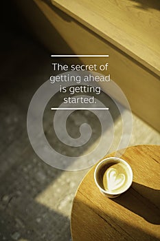 Inspirational quote poster on cup of coffee