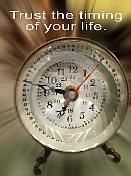 Inspirational quote - Trust the timing of your life. With old clock motivation on blur illustration background.