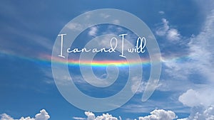 Inspirational quote written on a cloudy sky with a rainbow. Message with the  phrase I can and I will. Message or card. Concept of