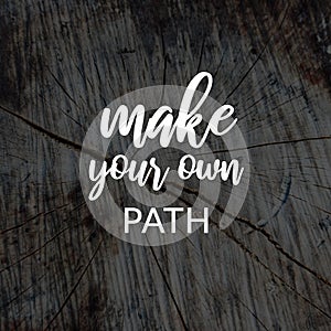 Inspirational quotes - Make your own path. Blurry background