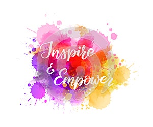 Inspire and Empower - handwritten modern calligraphy on watercolor paint splash