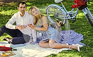 Inspiring feelings. Cute couple drinking wine picnic. Romance concept. Cheers. Celebrate anniversary. Attractive Couple