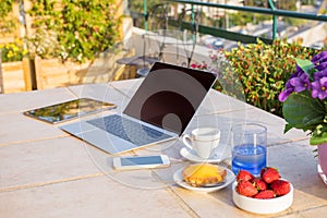 Inspiring working space outdoors with laptop, tablet and mobile phone