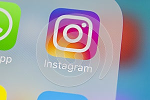 Instagram application icon on Apple iPhoneX smartphone screen close-up. Instagram app icon. Social media icon. Social network