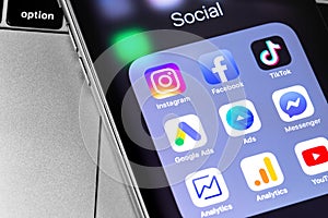 Instagram, Facebook, YouTube, TikTok, Google Ads, Analytics icon apps on the screen iPhone