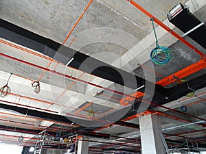 Installation of airconditioner ducting and chiller pipes system and hung it at the concrete slab.