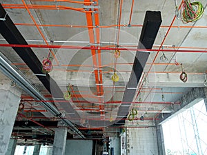 Installation of airconditioner ducting and chiller pipes system and hung it at the concrete slab.