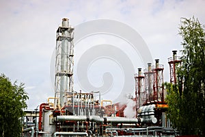 Installation of cogeneration of electricity and production of superheated steam with equipment and high pipes at an oil refining photo