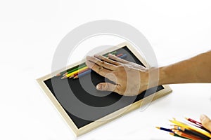 Installation of colored pencils and black board