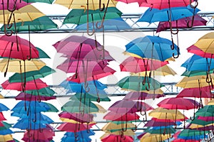 Installation of the colourful umbrellas.