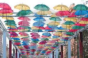 Installation of the colourful umbrellas.