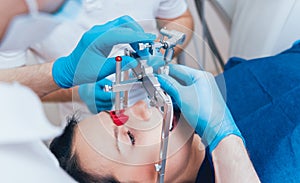 Installation of the face-bow. Functional diagnostics. Dental technology