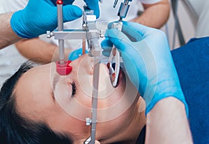 Installation of the face-bow. Functional diagnostics. Dental technology