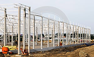 Installation of a factory building from reinforced concrete structures and steel prefabricated structures photo