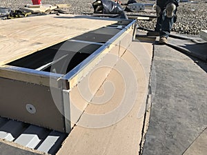 Installation of ISO on AC base; roofing repairs on ballasted EPDM commercial roof with