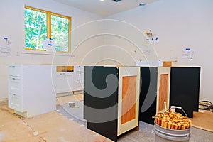 Installation of kitchen cabinet.