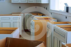 Installation of kitchen. the drawer in cabinet.