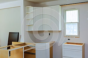 Installation of kitchen. the drawer in cabinet.