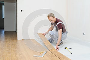 Installation of a laminate floorboard.