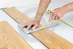 Installation of a laminate floorboard.