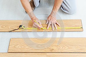 Installation of a laminate floorboard.