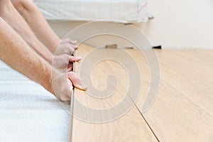 Installation of a laminate floorboard.