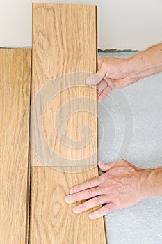 Installation of a laminate floorboard.