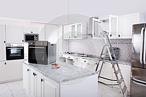 Installation Of Luxurious Oven In The Modular Kitchen