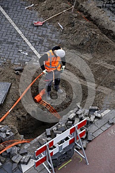 Installation of optic cables to houses