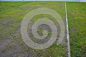 installation of a plastic mat as a replacement for the lawn.