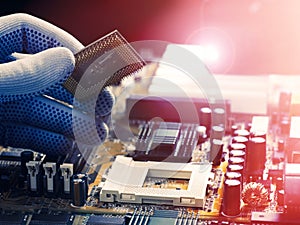 The installation of the processor into the socket of the motherboard.